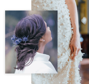 Italian bride with blue thistle in her hair, wearing a white wrap.